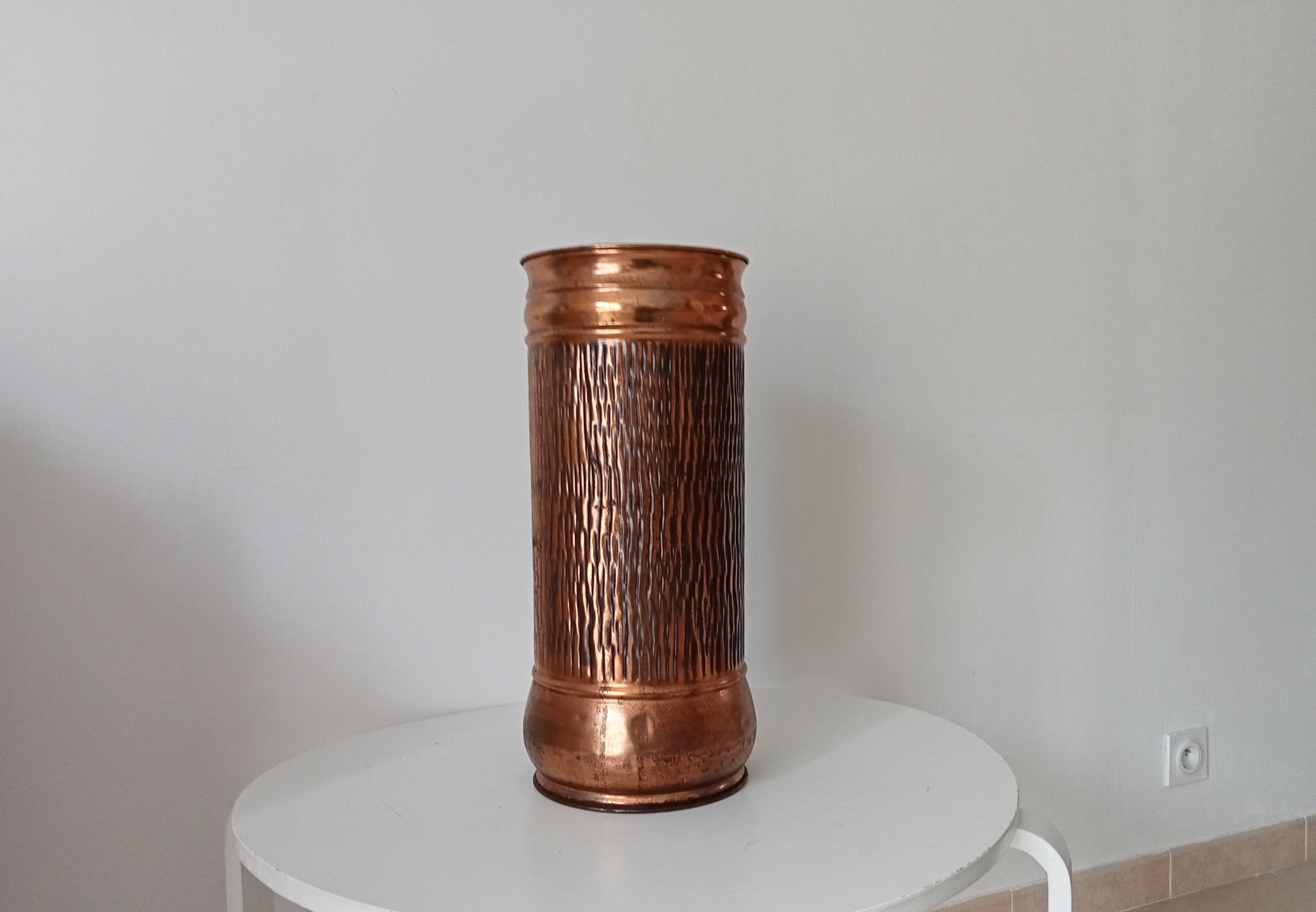 Vintage brutalist umbrella stand in hammered copper with a wood effect.