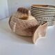 Many flat plates, dish, sauce boat, vegetable dish.