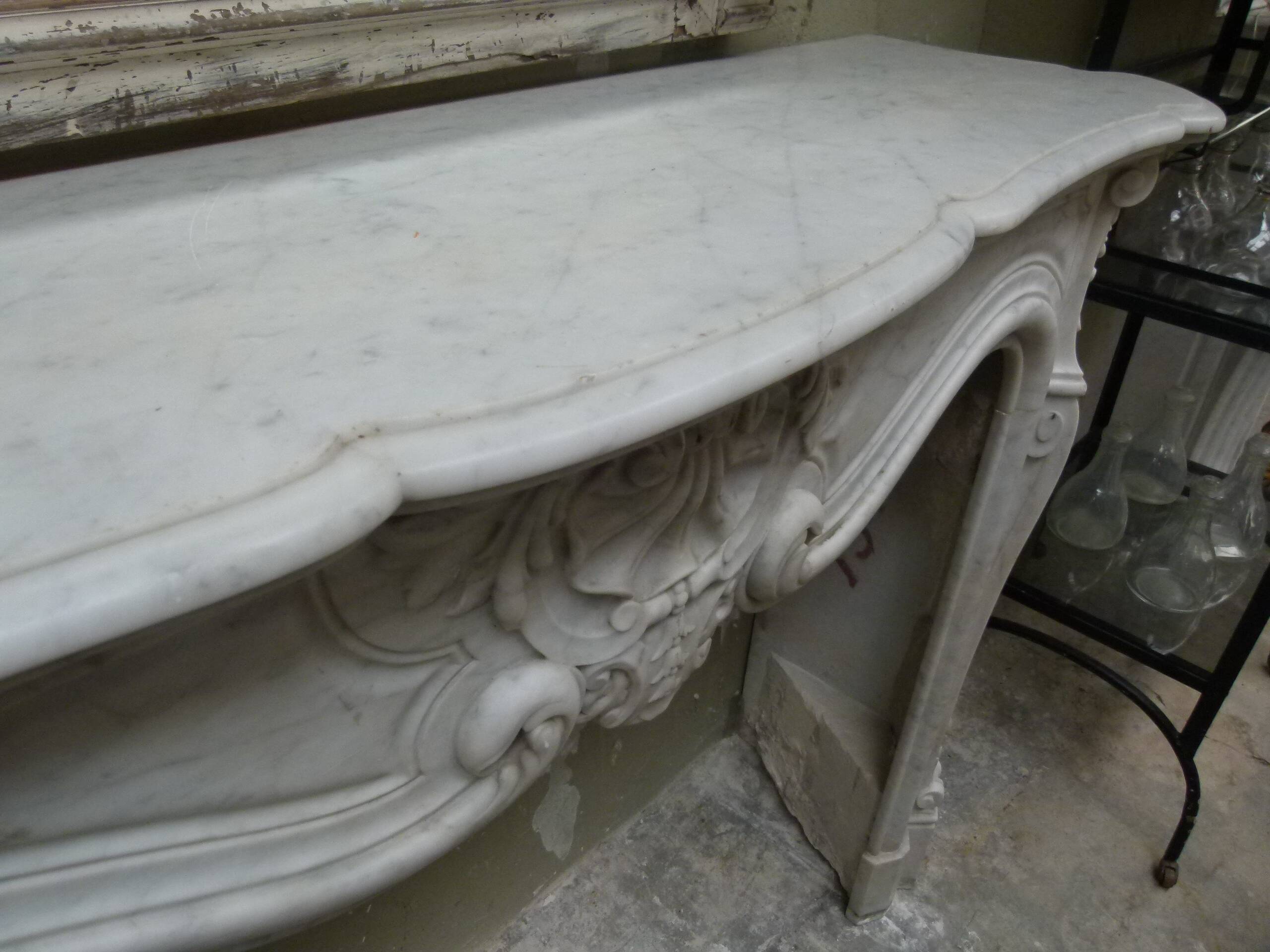 Louis XVI marble fireplace from the 19th century