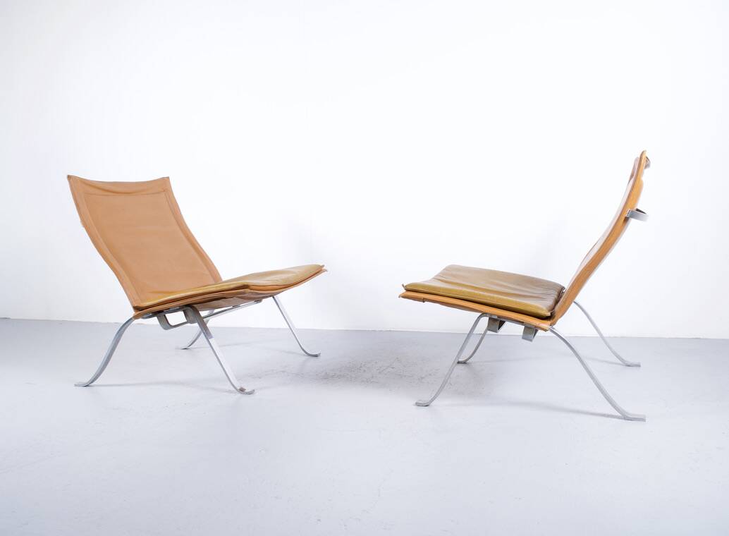 Imposing pair of leather and steel armchairs from the 1960s