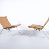 Imposante paire de fauteuils cuir et acier années 60'