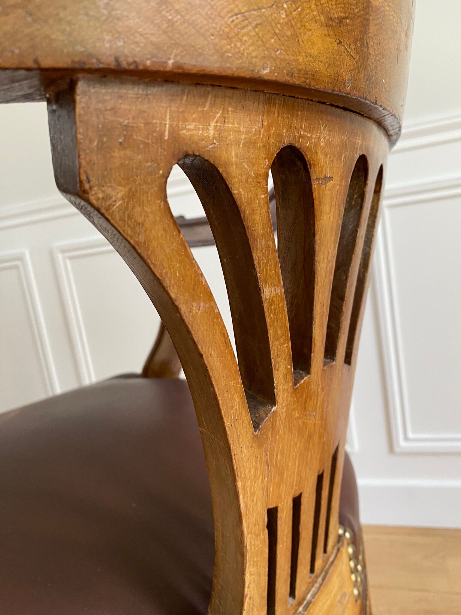 Vintage office chair in wood and brown studded leather late nineteenth