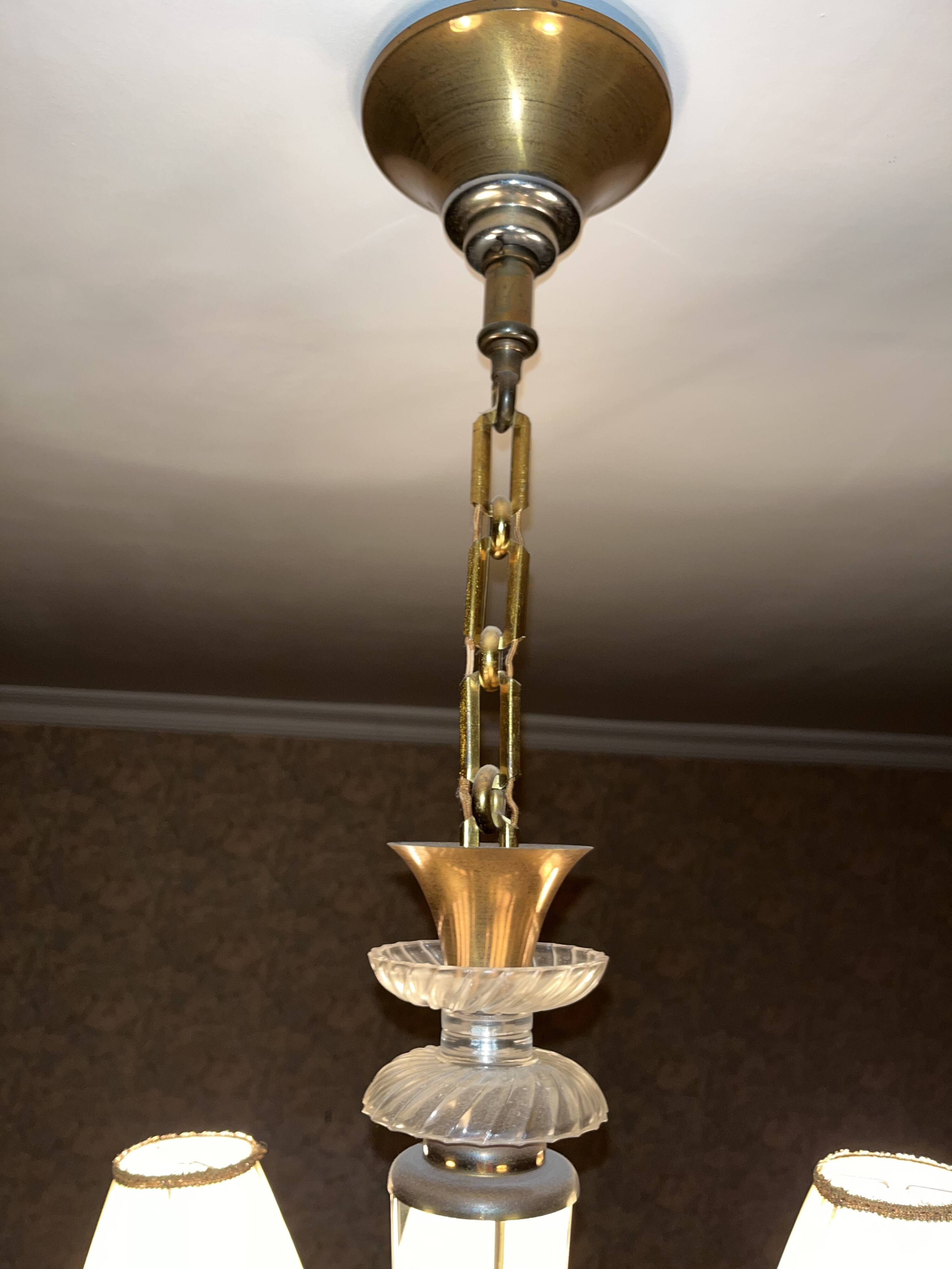 Chandelier and its wall lights