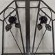 Pink-decorated iron umbrella door.