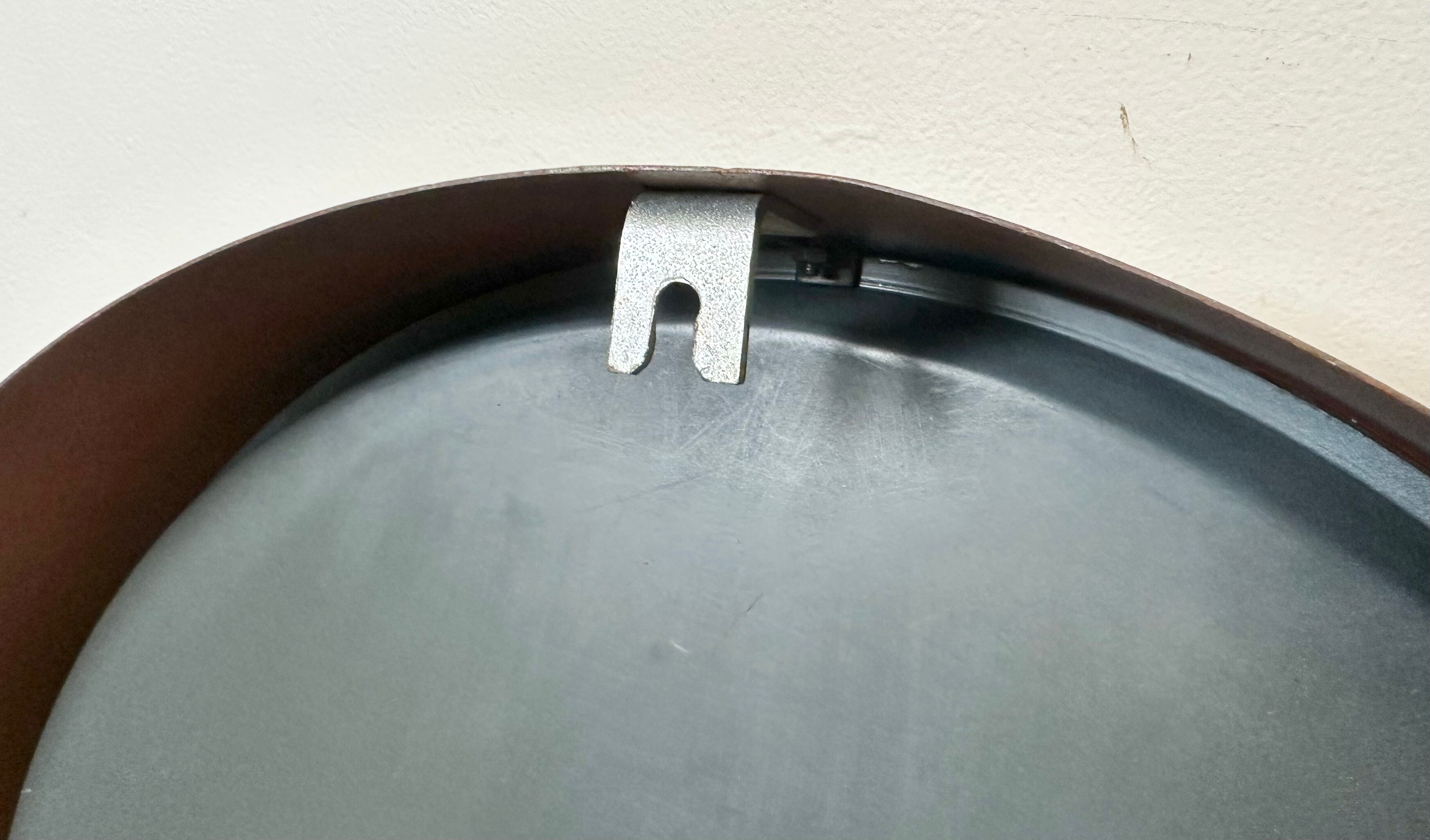 Brown industrial factory wall clock from Pragotron, 1960s