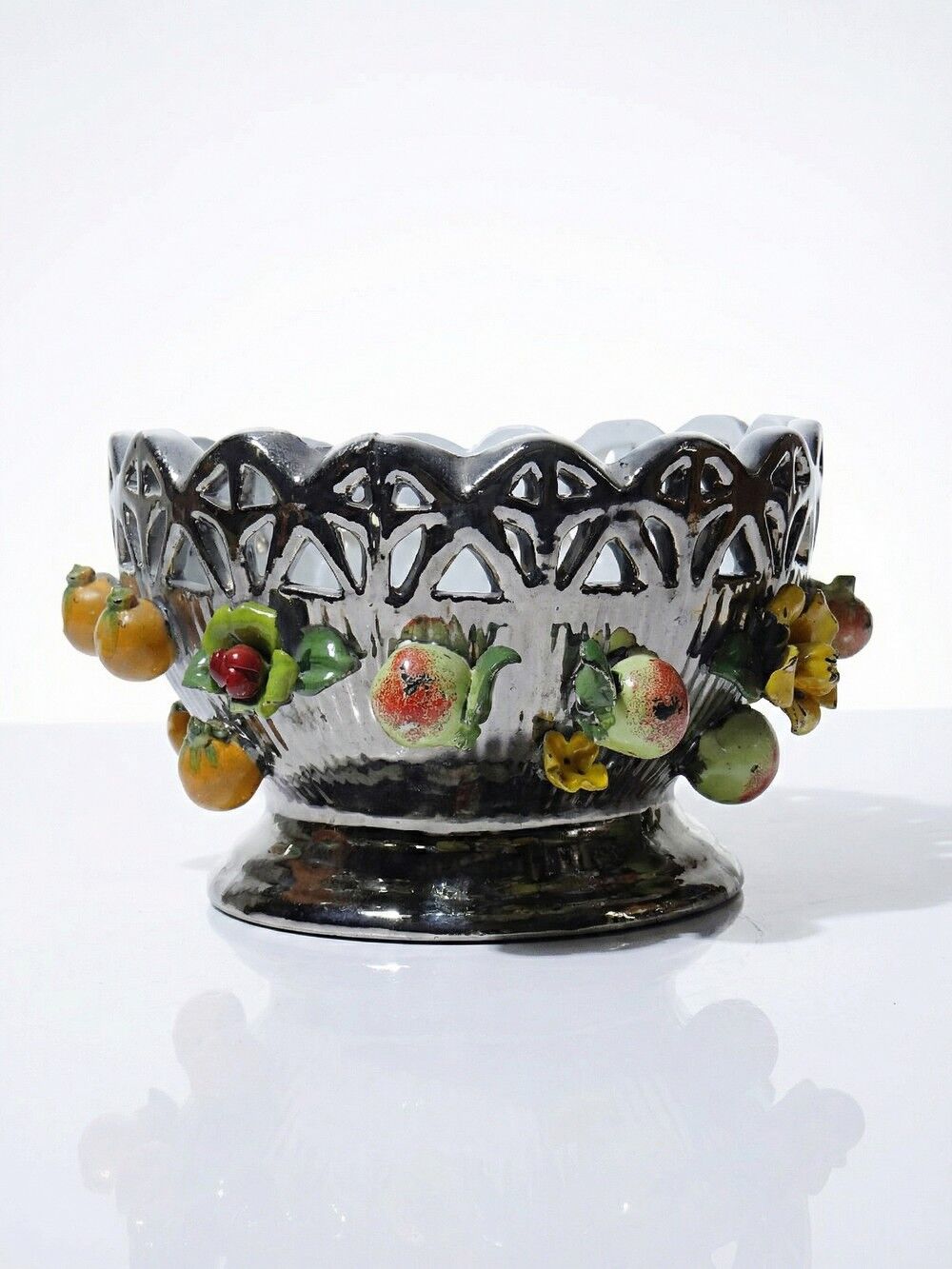 Vintage Italian silver-plated porcelain bowl with cut-out design of fruits and flowers.