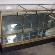 Counter or shop window in oak glass and brass France around 1920