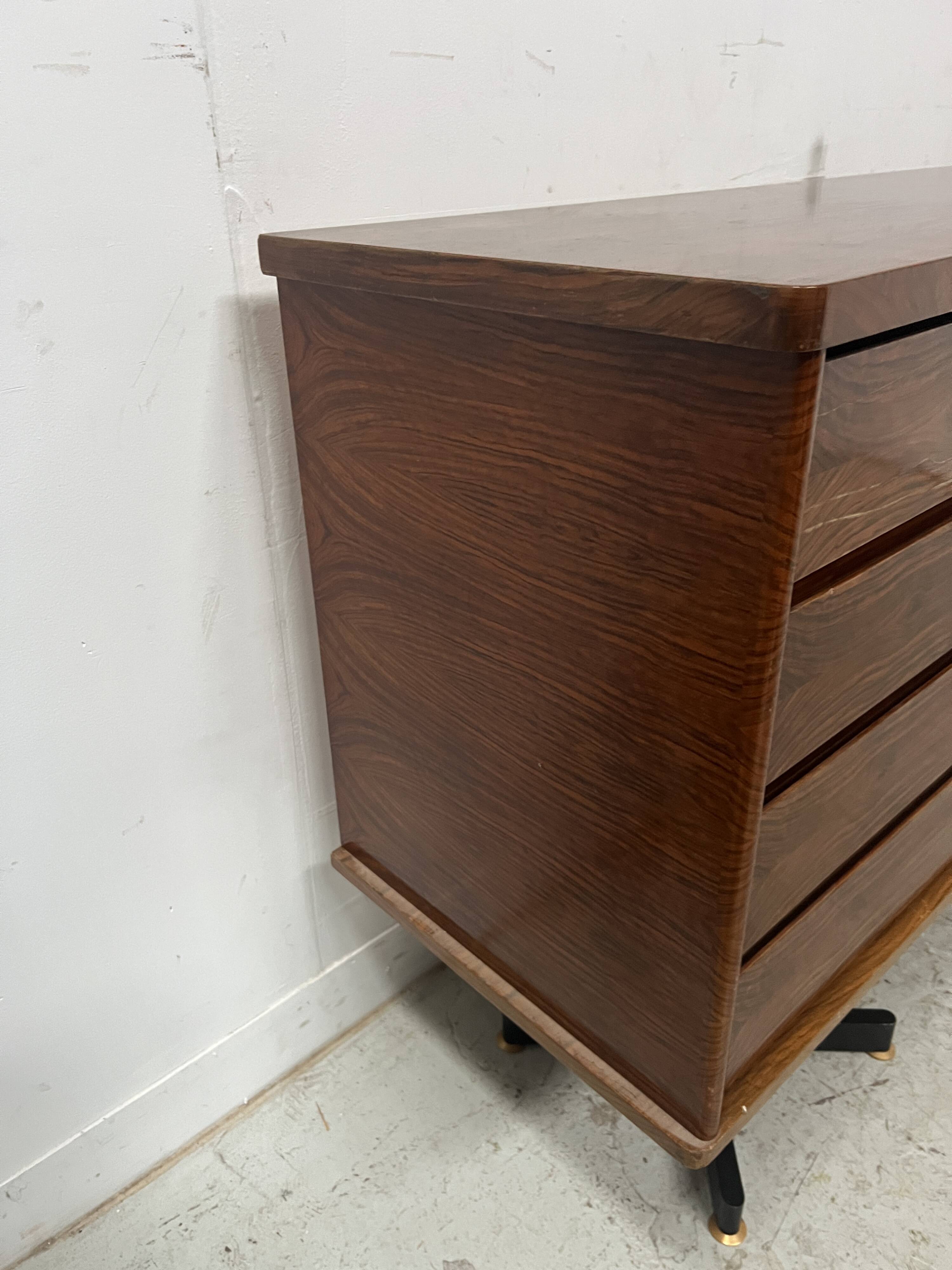 Scandinavian enfilade in veneered wood with iron legs, 20th century.
