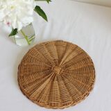 Decorative mirror tray surrounded by vintage rattan / wicker