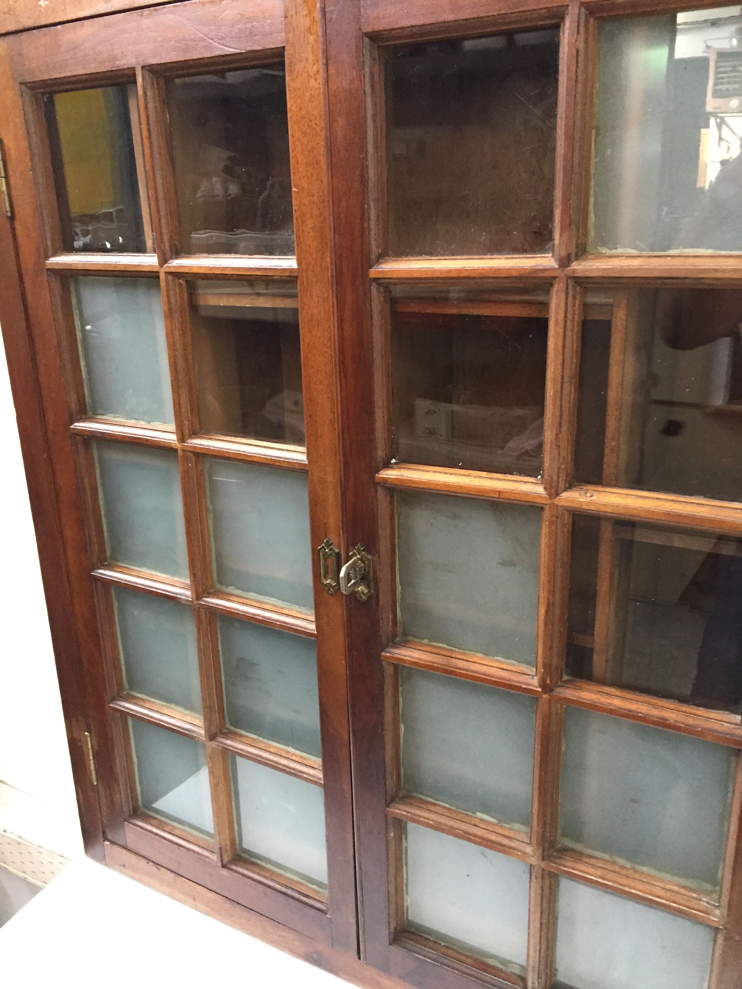 Old wall case has pharmacy