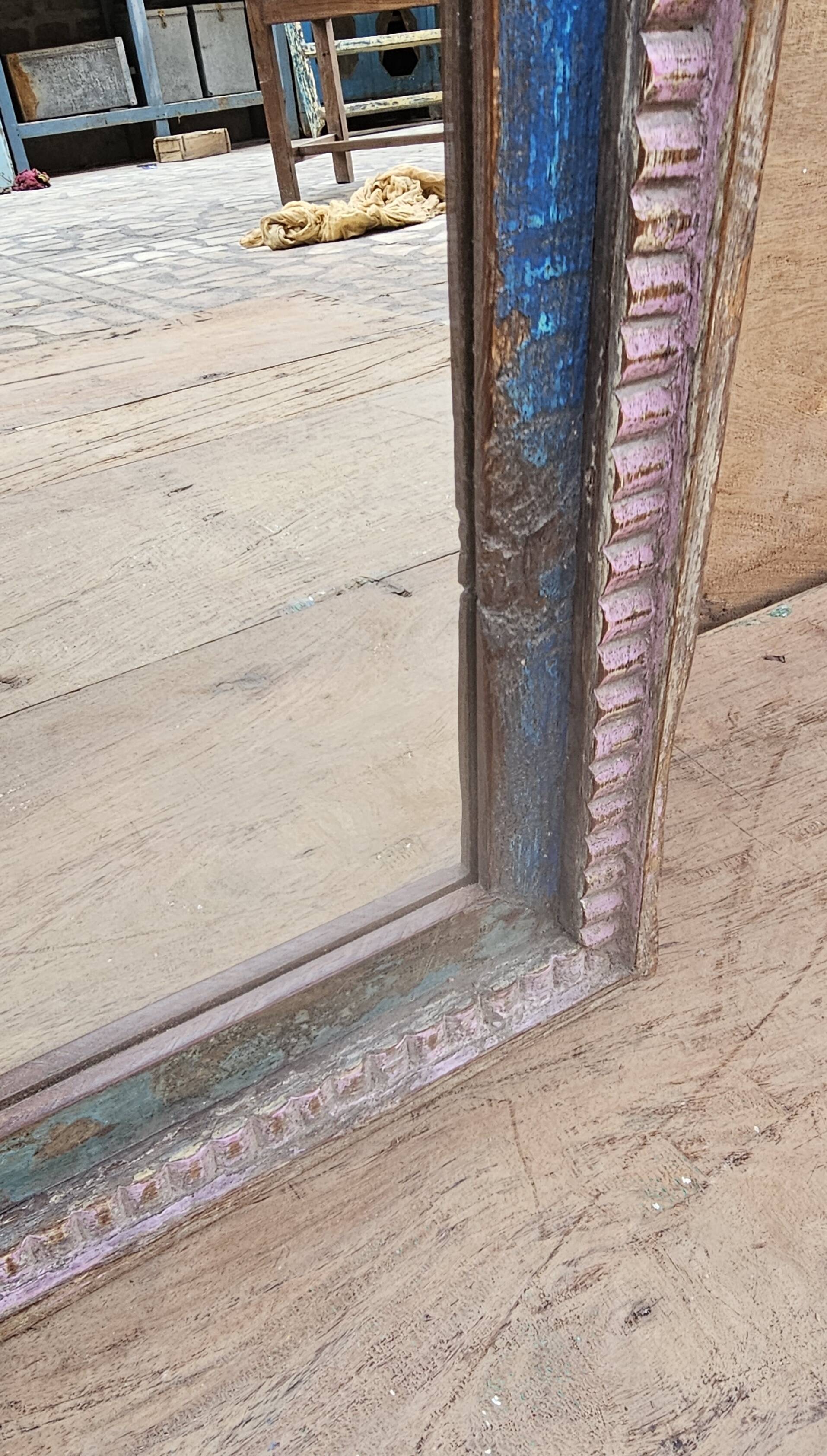 Old art deco mirror in burmese teak