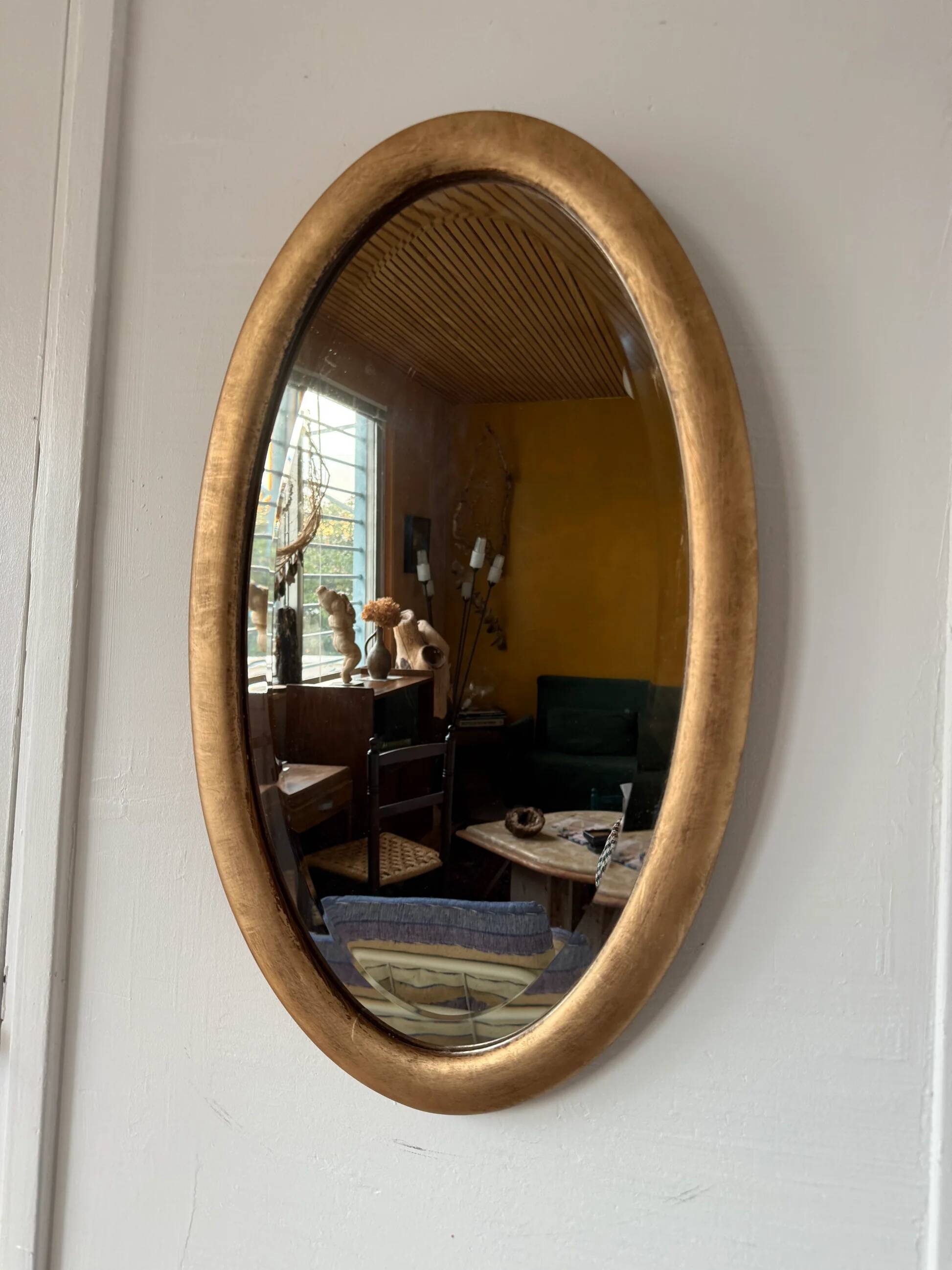 Miroir doré ovale ancien glace biseautée