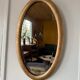 Miroir doré ovale ancien glace biseautée