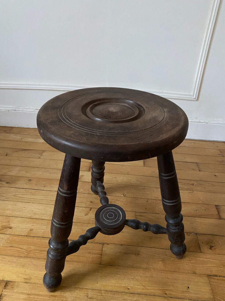Turned wooden tripod stool