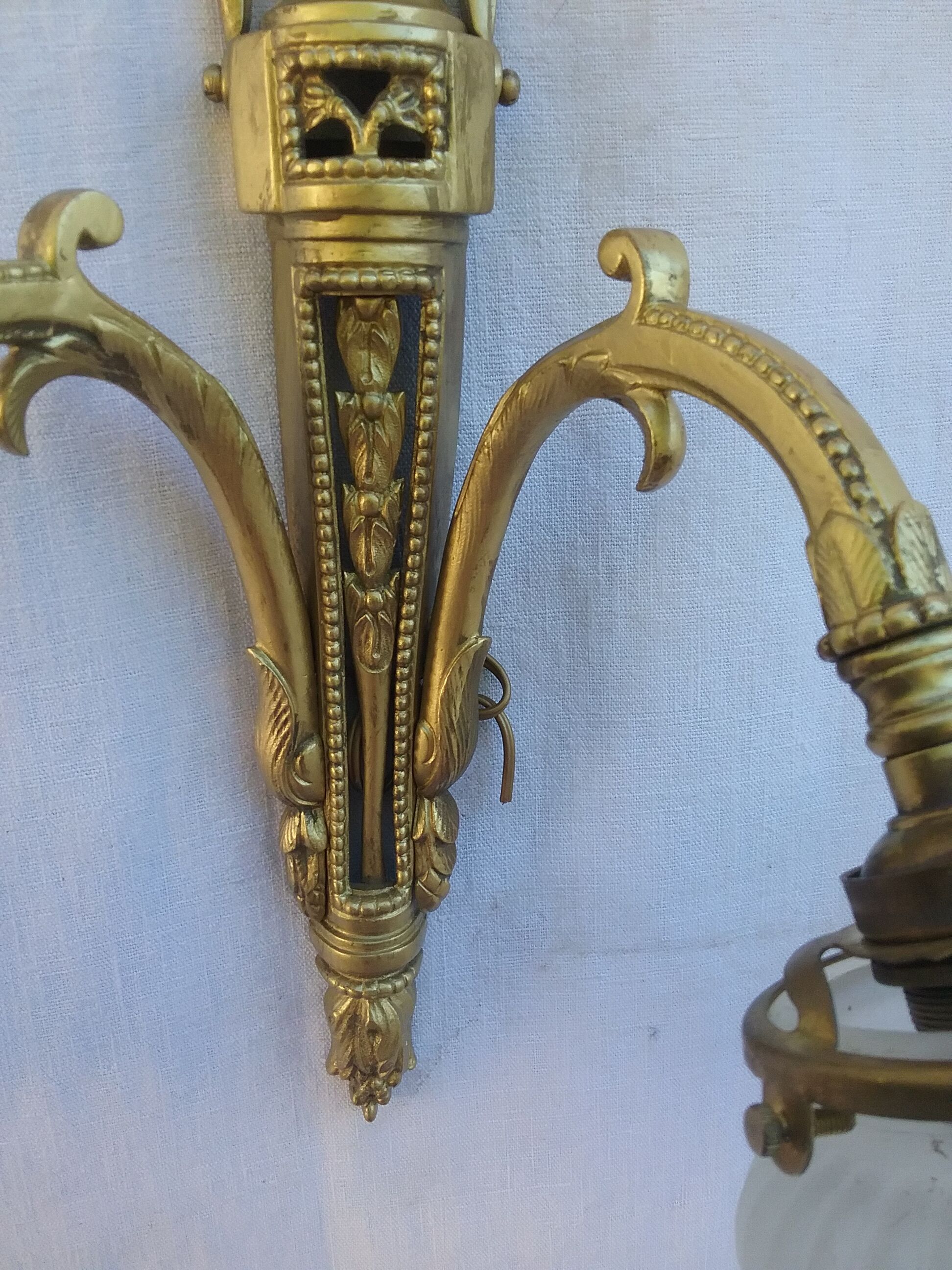 Pair of brass double wall light