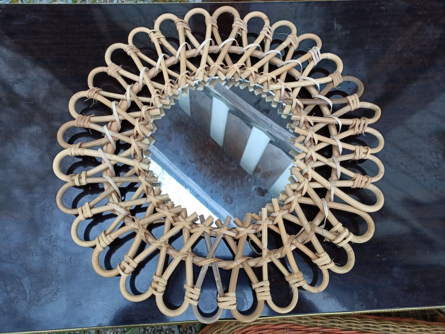 Round rattan mirror