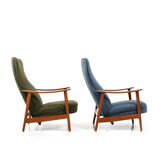 Pair of mid century Danish reclining lounge chairs in teak