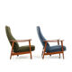 Pair of mid century Danish reclining lounge chairs in teak