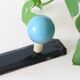 Wall-mounted coat rack, metal and colored wooden hook, 1960