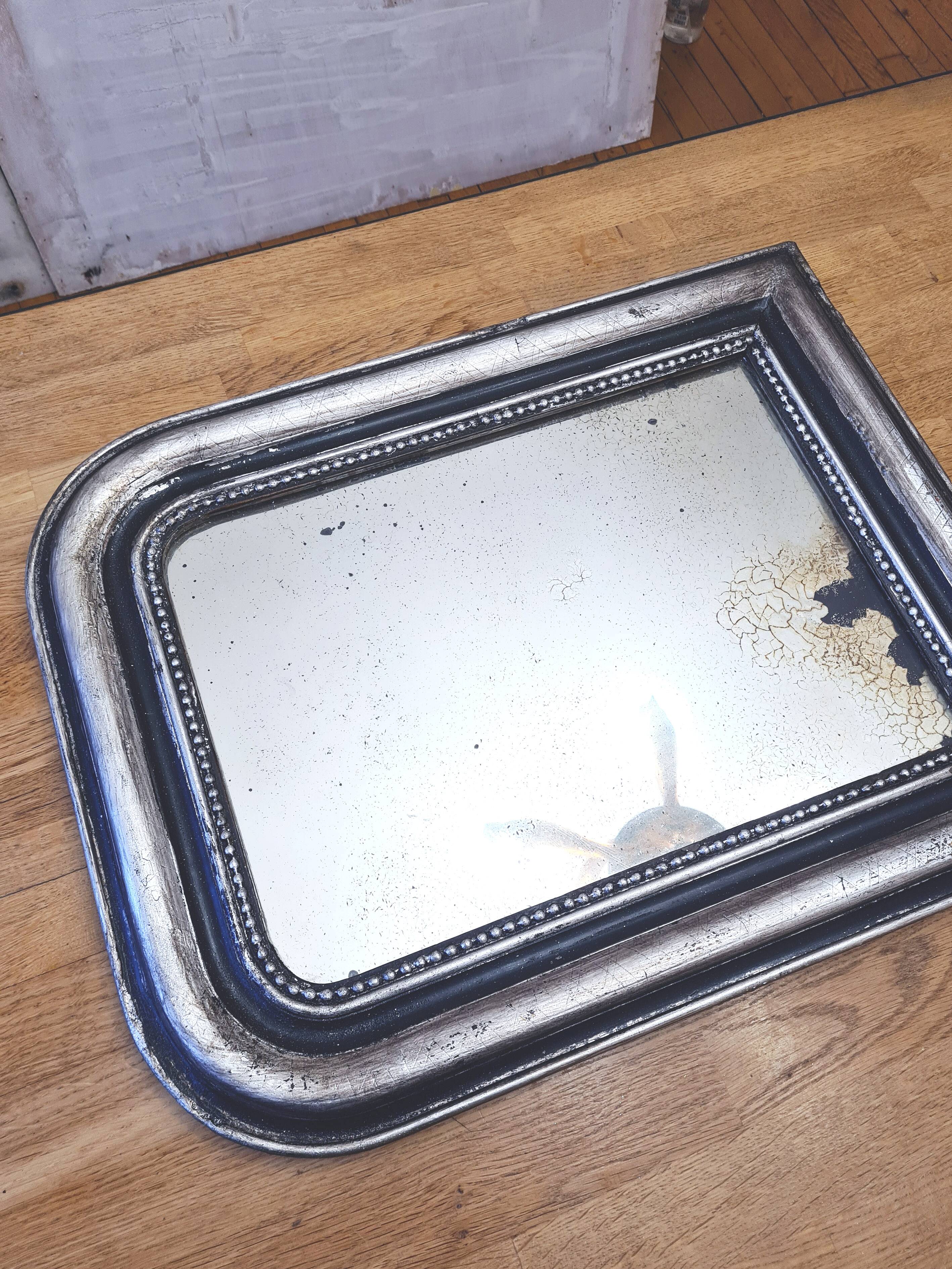 Old Louis Phillipe mirror, silvered with silver leaf.