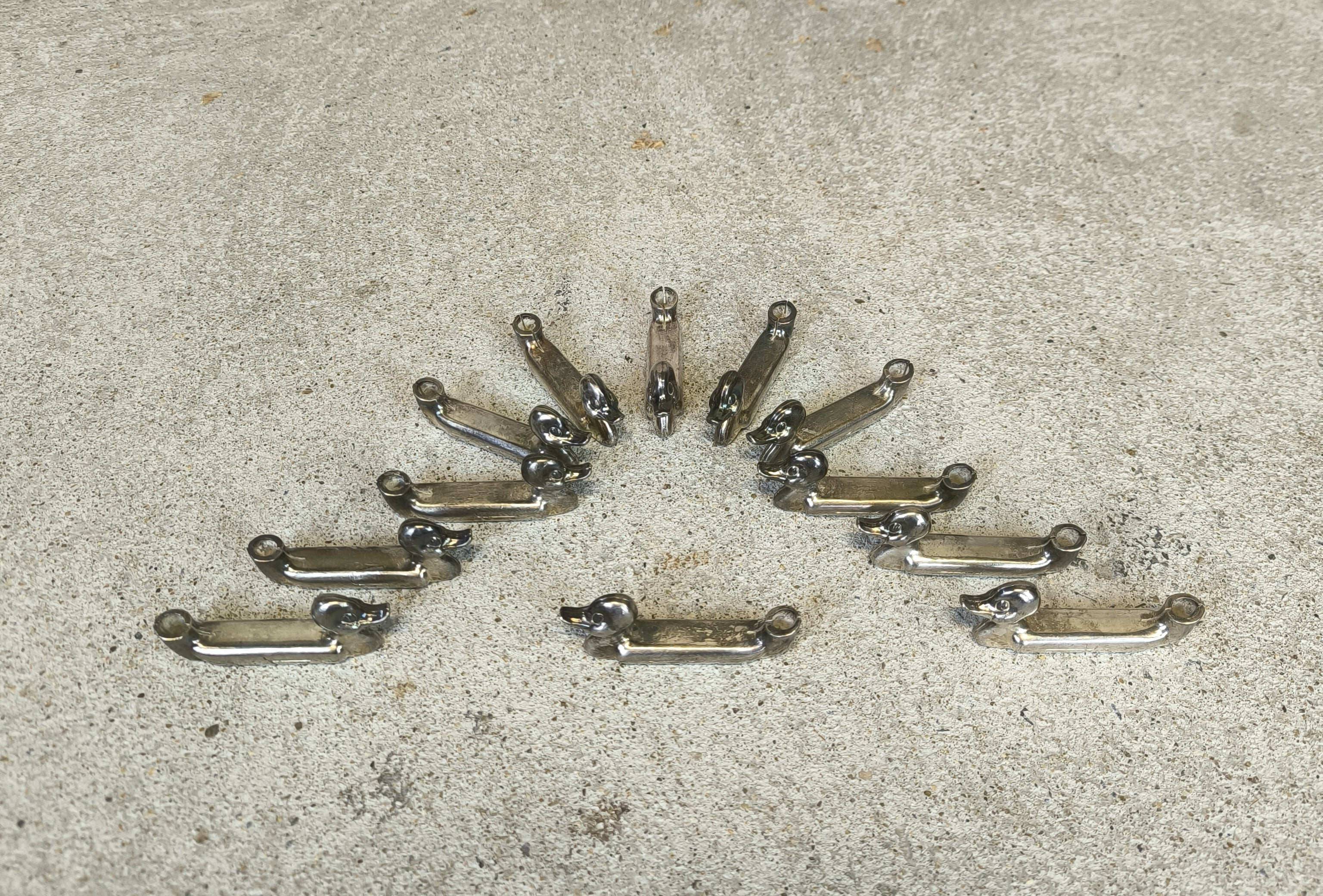 Set of 12 vintage knife rests, place card holders.
