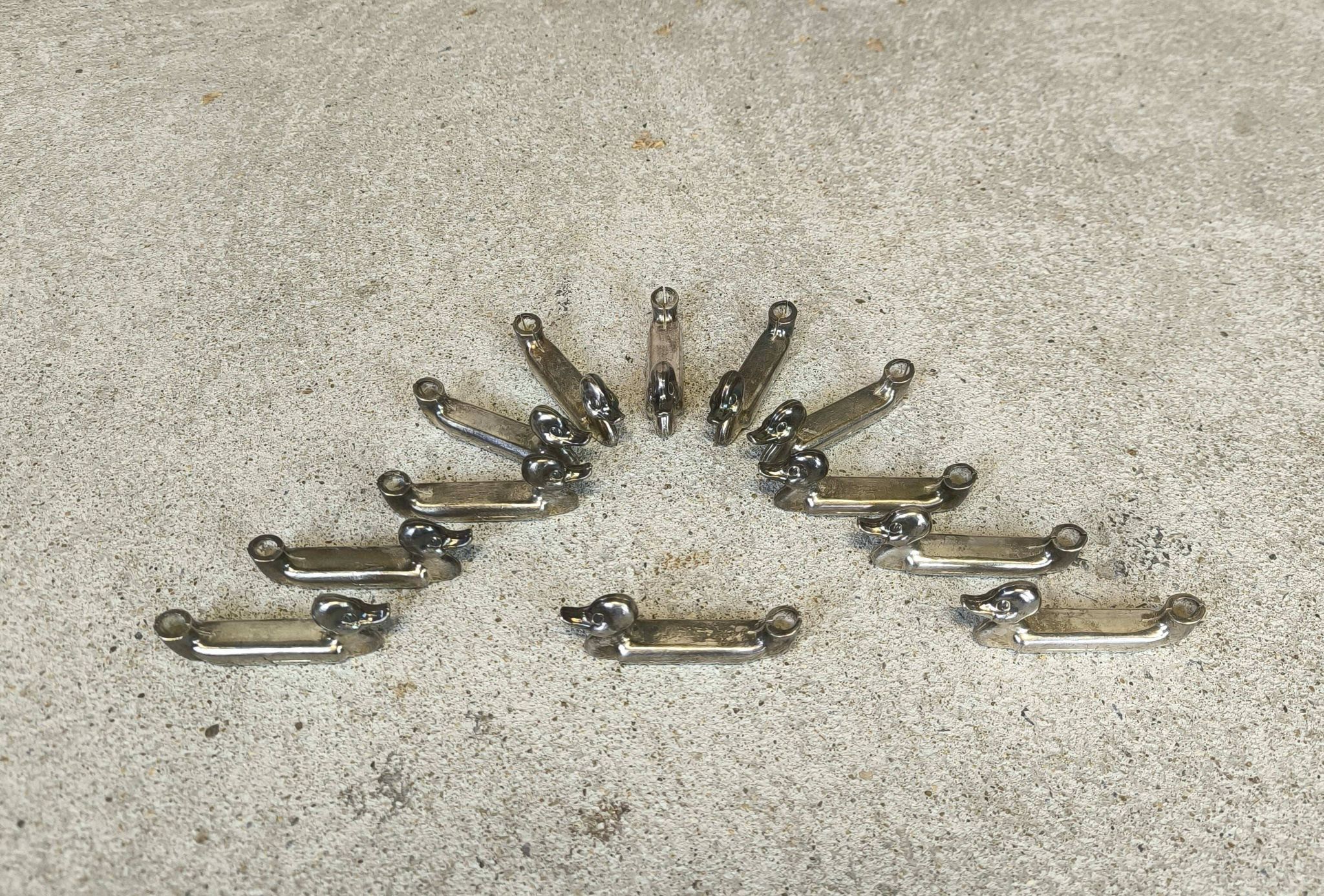 Set of 12 vintage knife rests, place card holders.