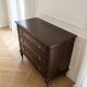 Antique Louis XVI commode in brown wood and gilded brass.