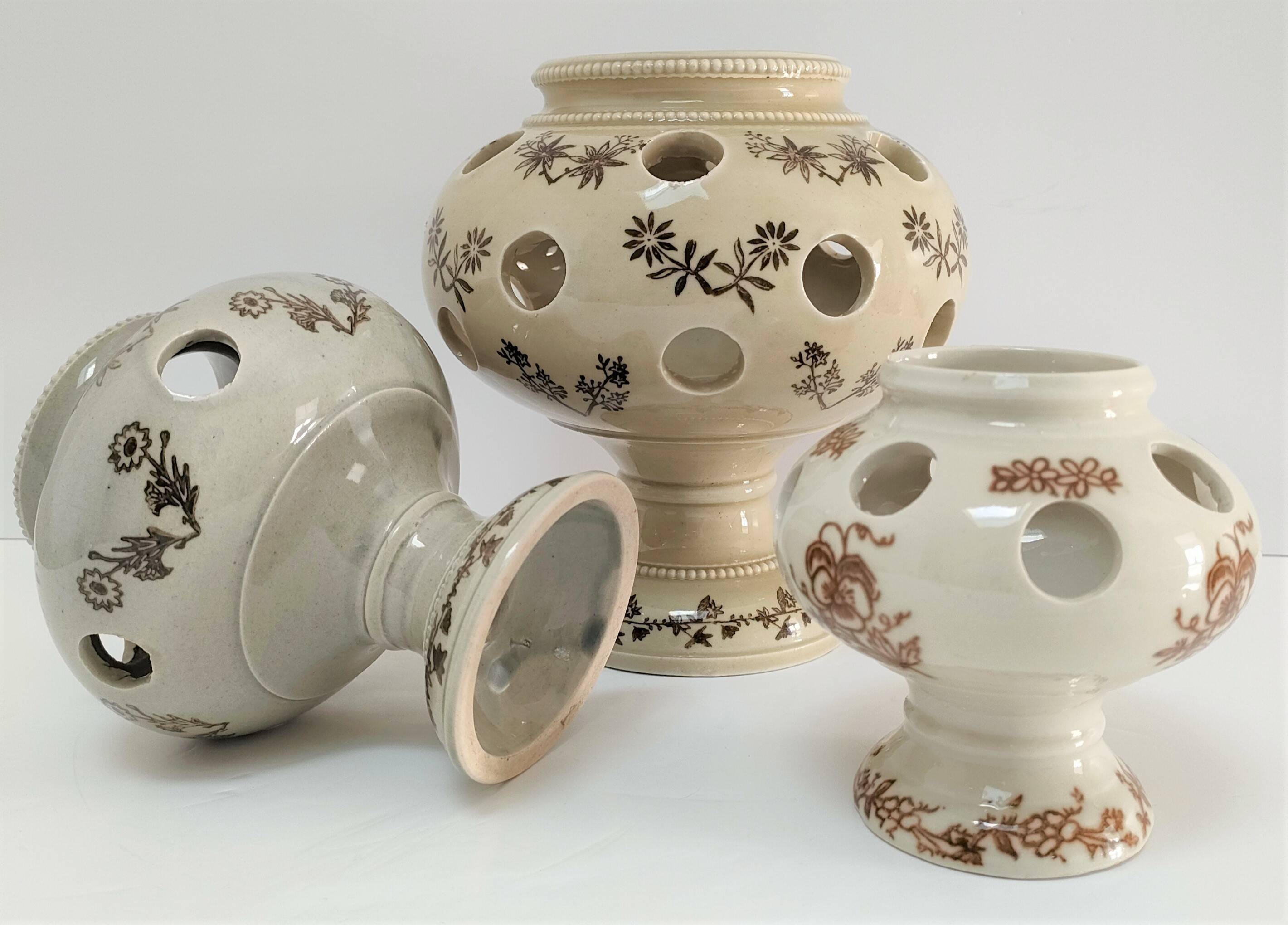 Three Saint-Uze ceramic tealight candle holders, early 20th century
