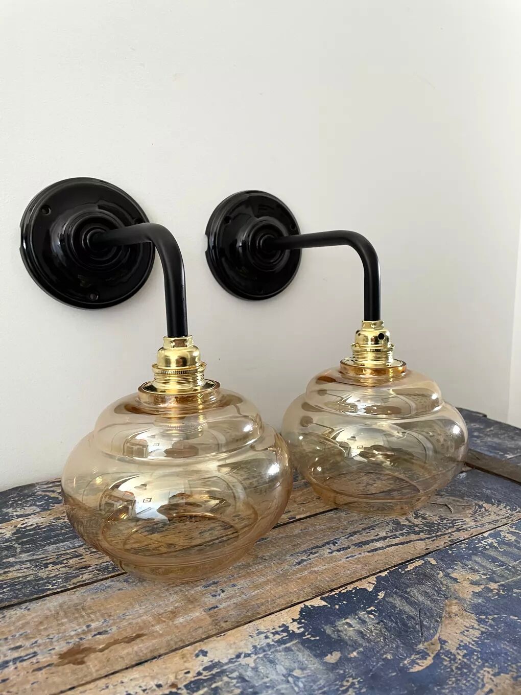 Pair of vintage sconces in electrified golden glass to nine