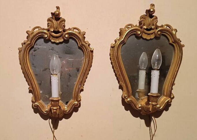 Vintage gold mirror sconces from the late 1950s.