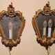 Vintage gold mirror sconces from the late 1950s.