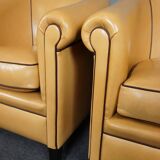 Set of 2 club chairs in blond sheepskin