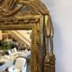Louis XVI period mirror in carved and gilded wood – Late 18th century