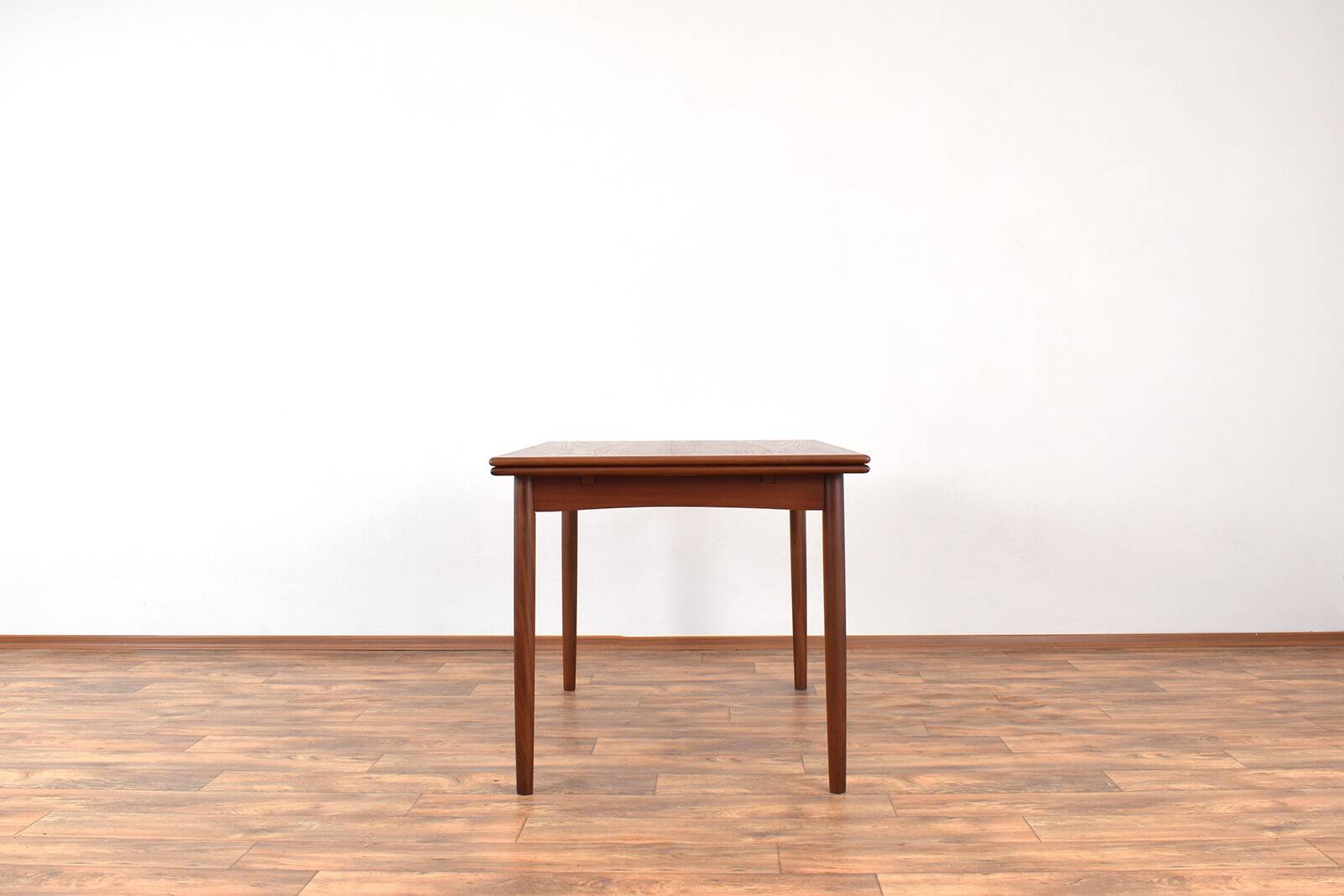 Mid-century Danish teak extendable dining table, 1960s.