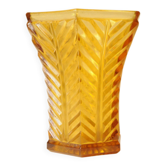 Vintage Art Deco vase in amber yellow cut glass with geometric design.