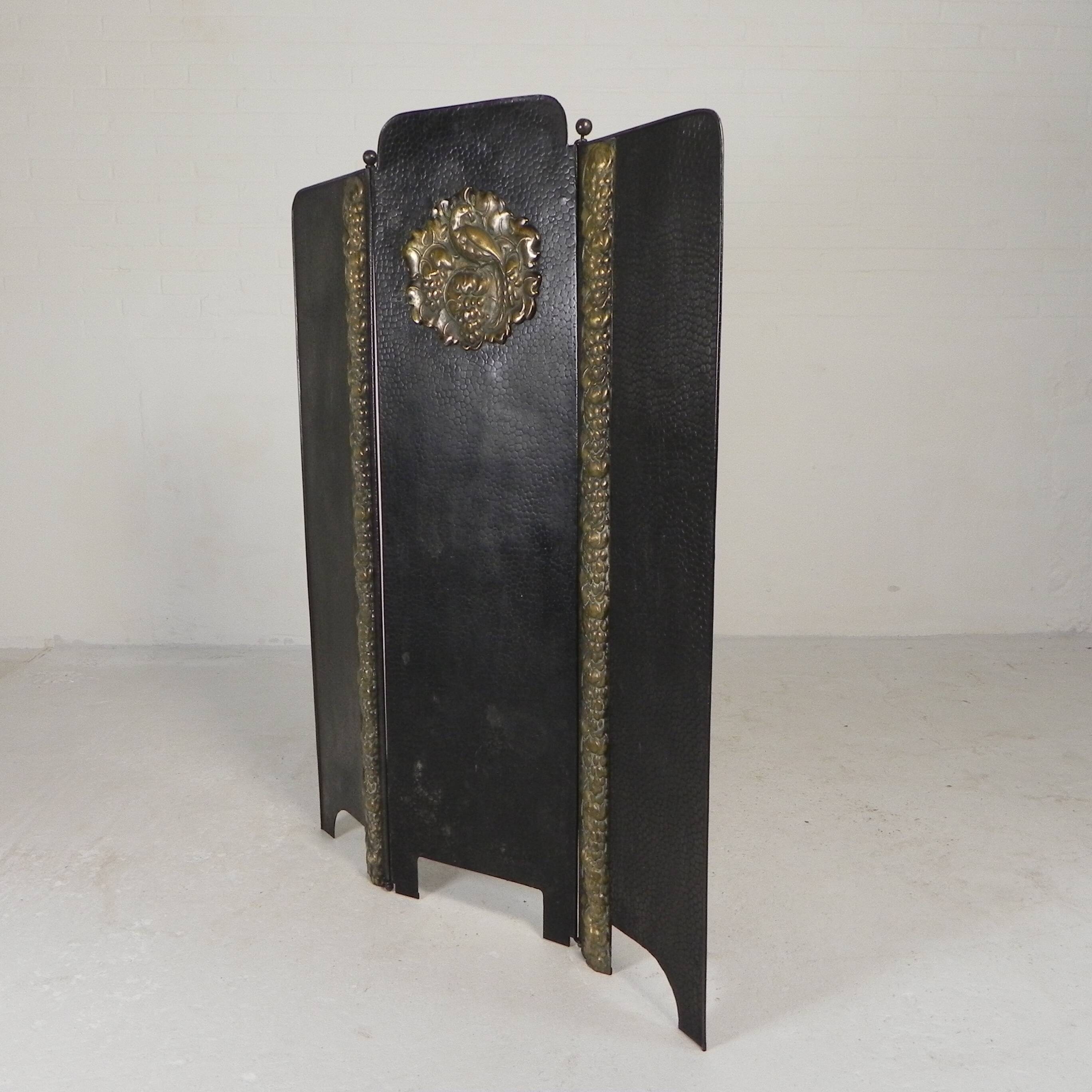 Art Deco screen in steel with brass details, 1930s.