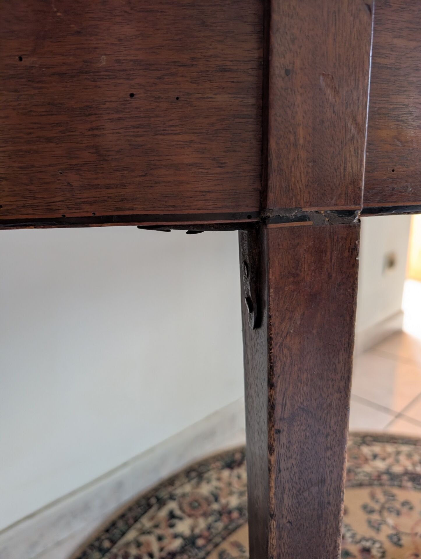 Old half-moon table or serving trolley on wheels
