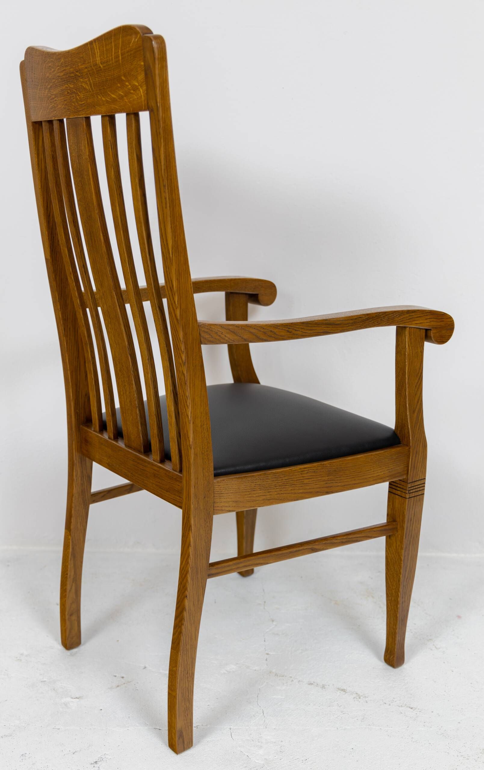 Set of 6 Art Nouveau chairs and armchairs in oak and leather.