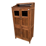 Art Deco glass-fronted cabinet in Burmese teak with original patina.