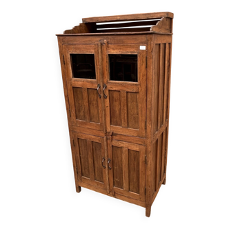 Art Deco glass-fronted cabinet in Burmese teak with original patina.