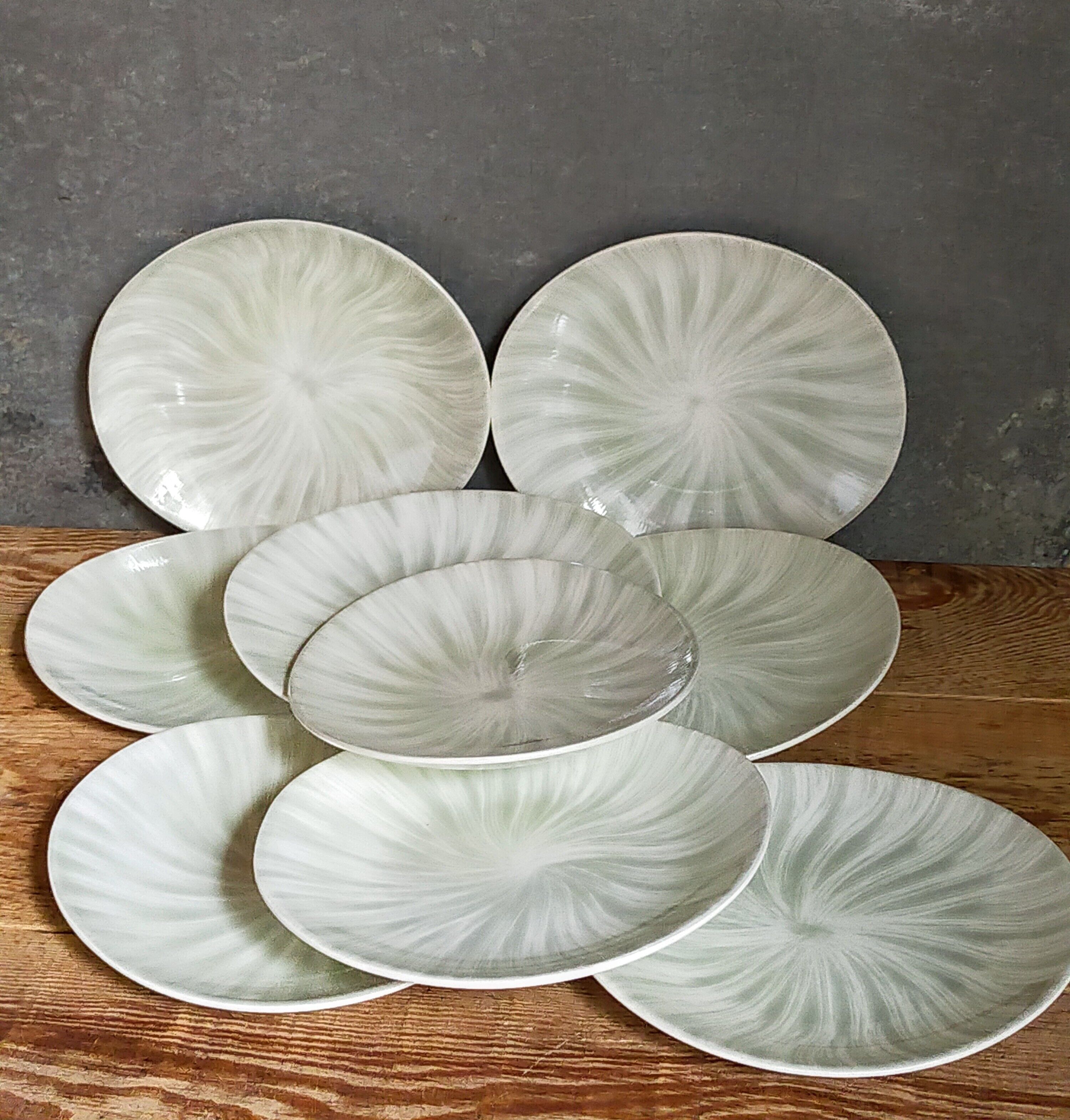 Nine earthenware plates from Salins-les-Bains vintage