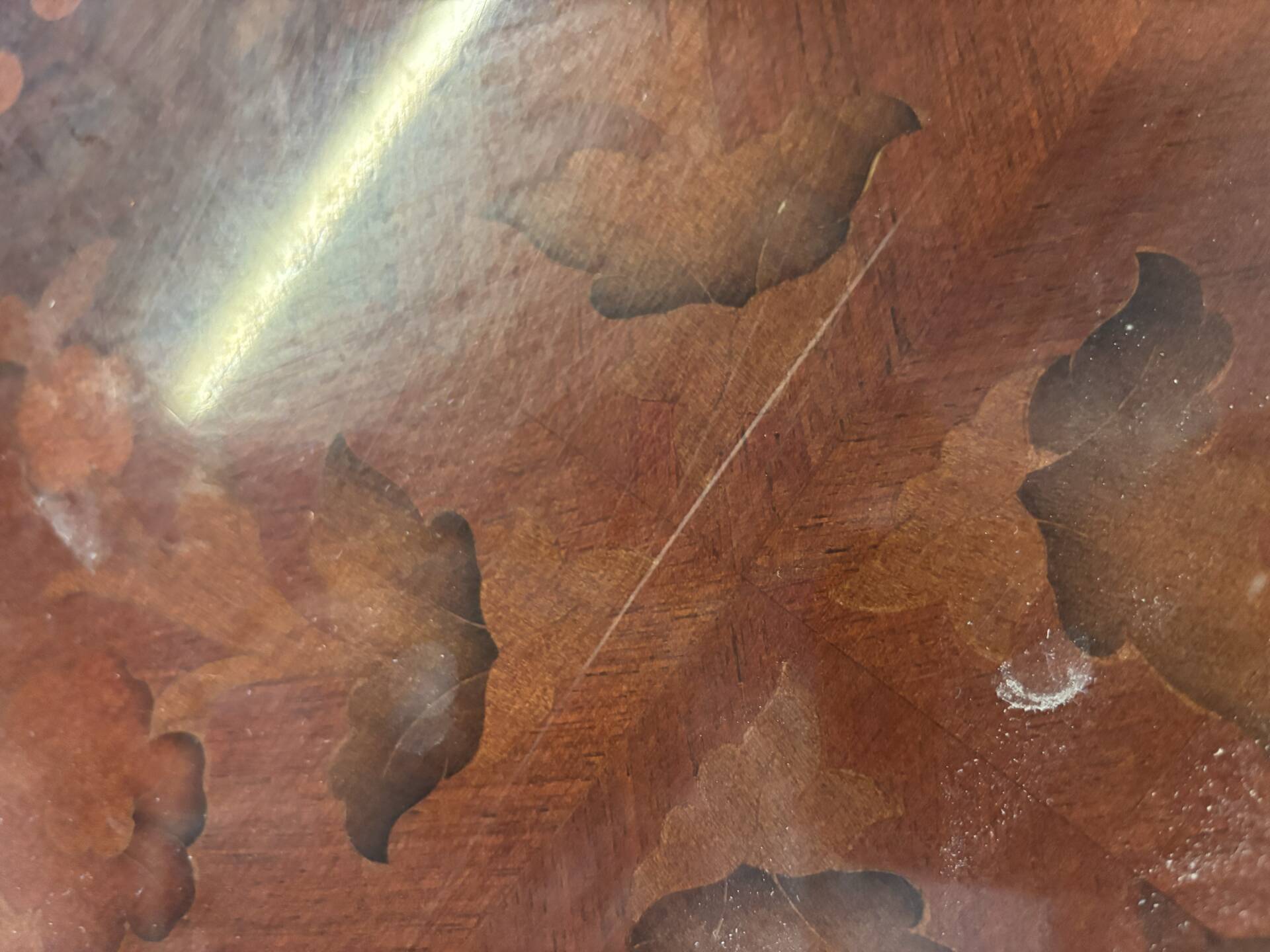 Oval table with marquetry top