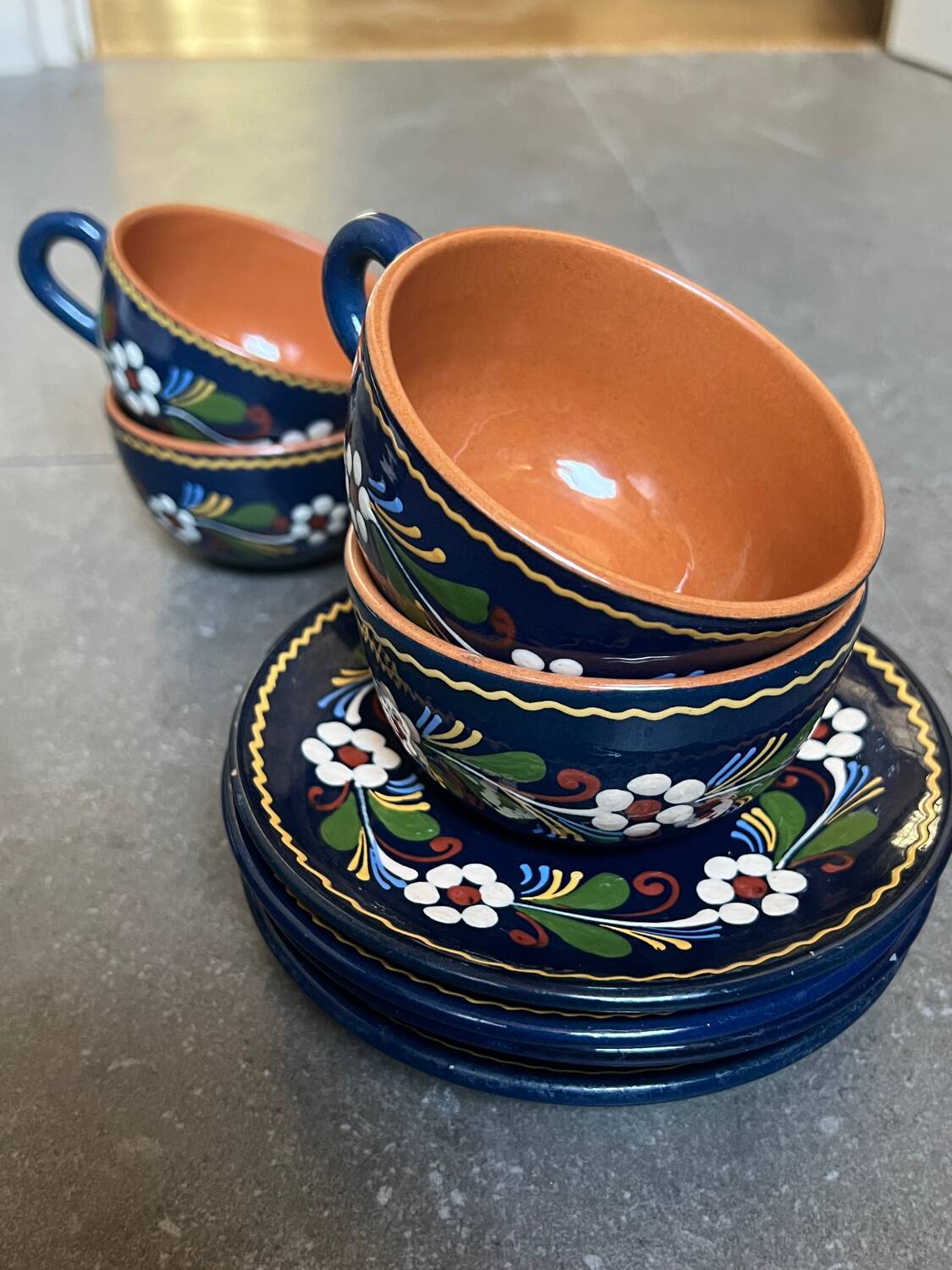 4 teacups and saucers