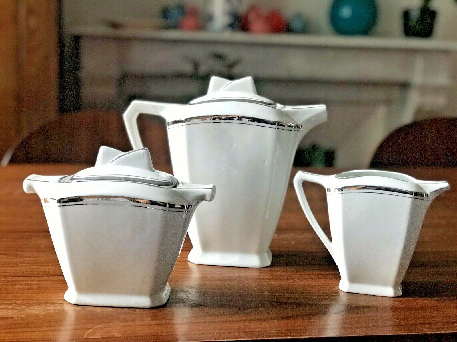 Art deco coffee service white porcelain of limoges liseré silver signed p.f.
