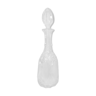 Bouteille en verre sculpté