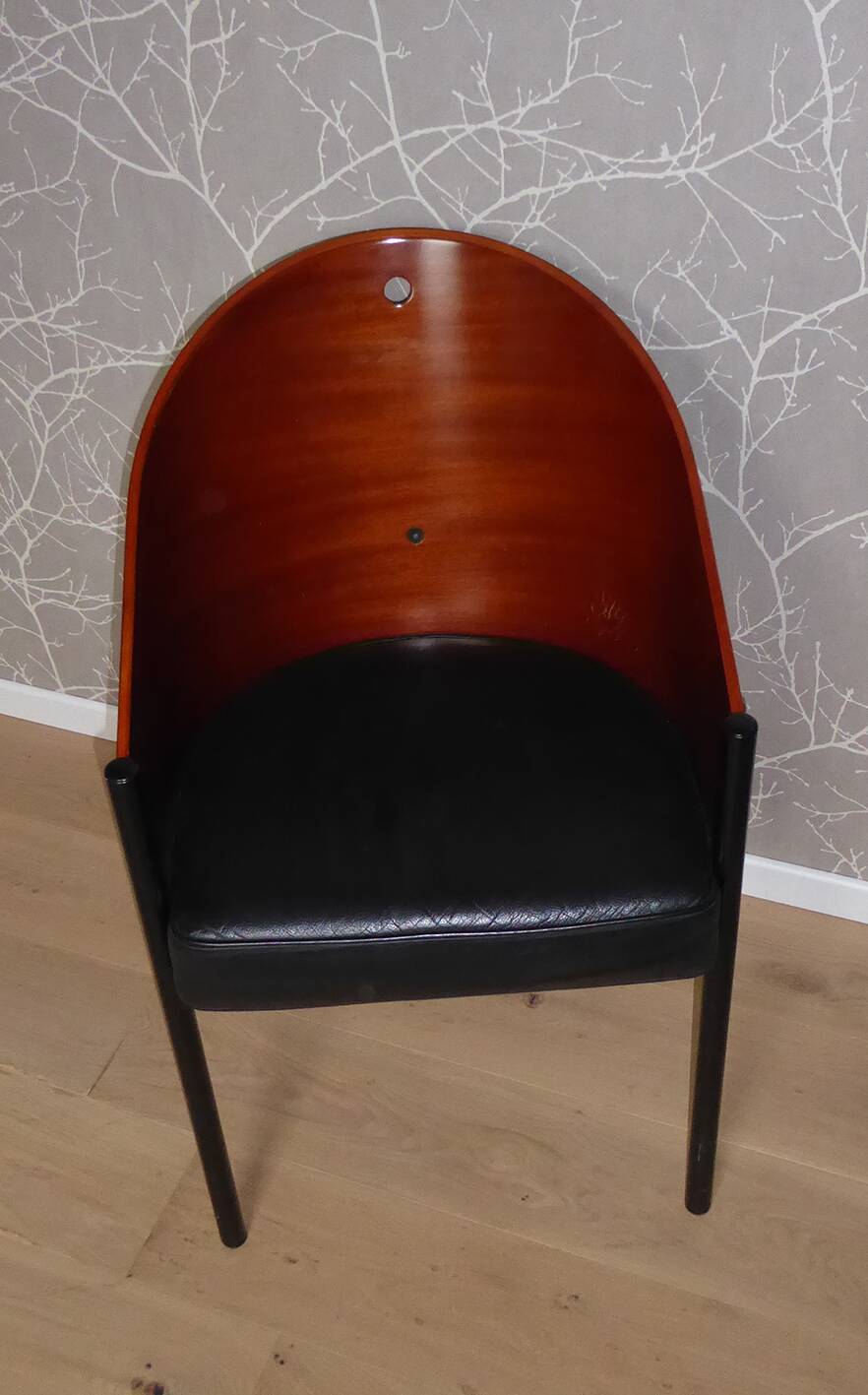 Coste mahogany and black armchair