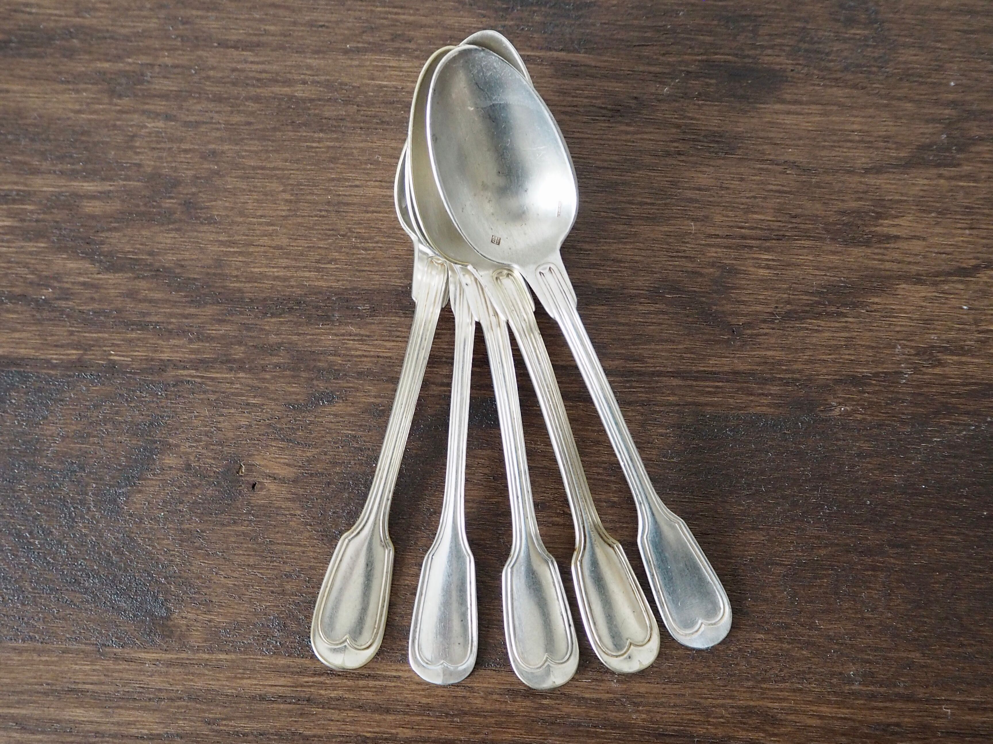 Set of 5 white metal spoons from the 20s