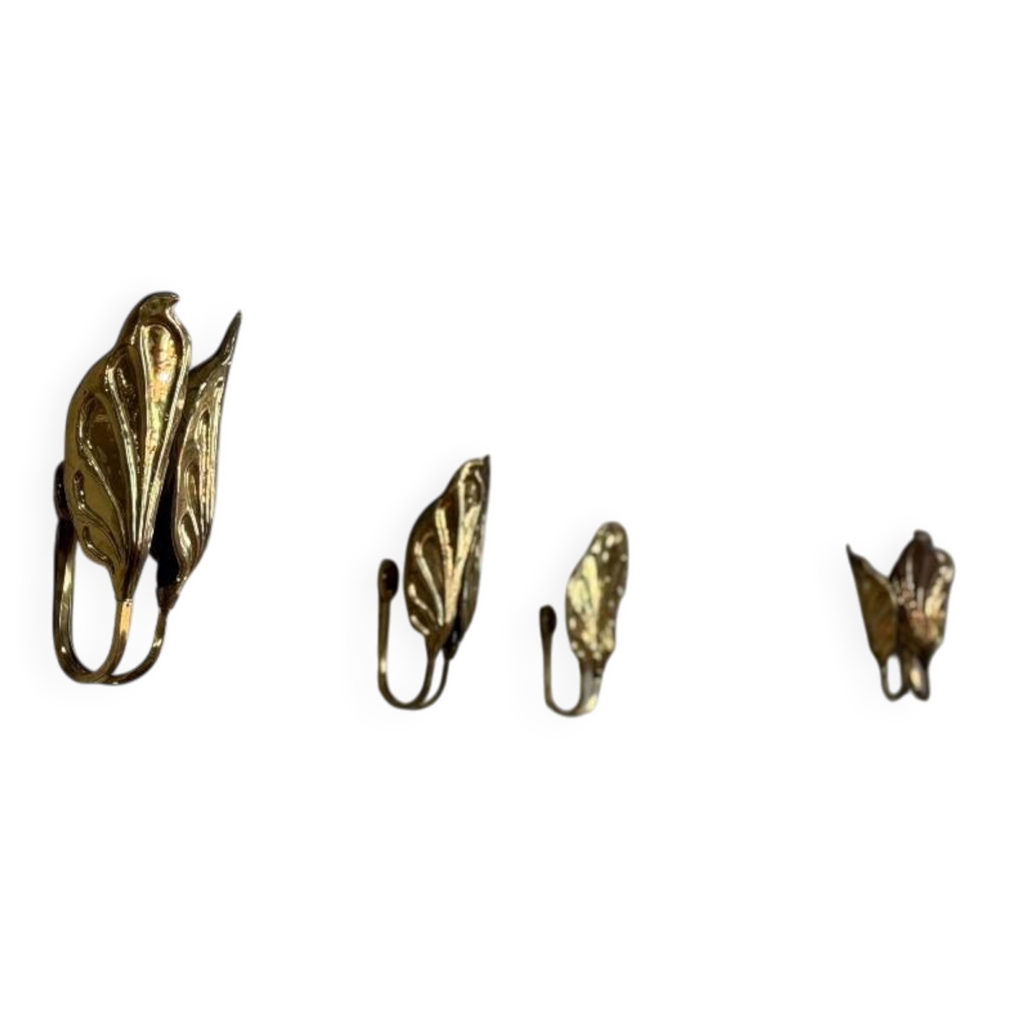 Set of four gilt brass wall lights, Tommaso Barbi, circa 1960.