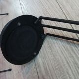 Ashtray with mechanism on foot