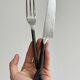 Set of 4 hammered metal cutlery with snail pattern.